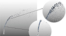 A simulated liquid jet breaks apart in a cross flow.